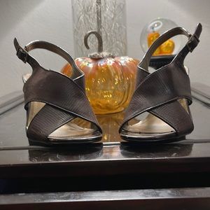 Size 8.5 four inch chocolate rich sandal style pump.